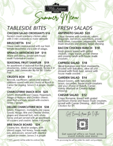 Villa Antonio Winery Summer Menu page with two-column layout: Tableside Bites on the left and Fresh Salads on the right, over a green olive-branch background.